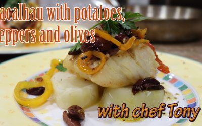 Bacalhau with potatoes, bell peppers, garlic and olives